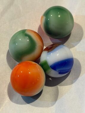 Vintage corkscrew marbles four glass marbles